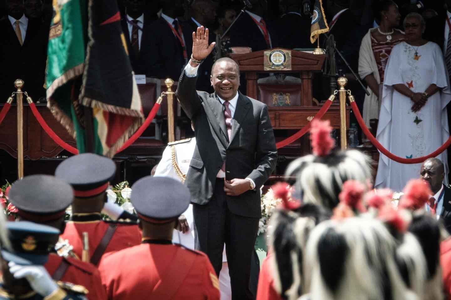 Kenyan President Uhuru Kenyatta arrives Tuesday to take the oath of office for his second term at Kasarani stadium in Nairobi.