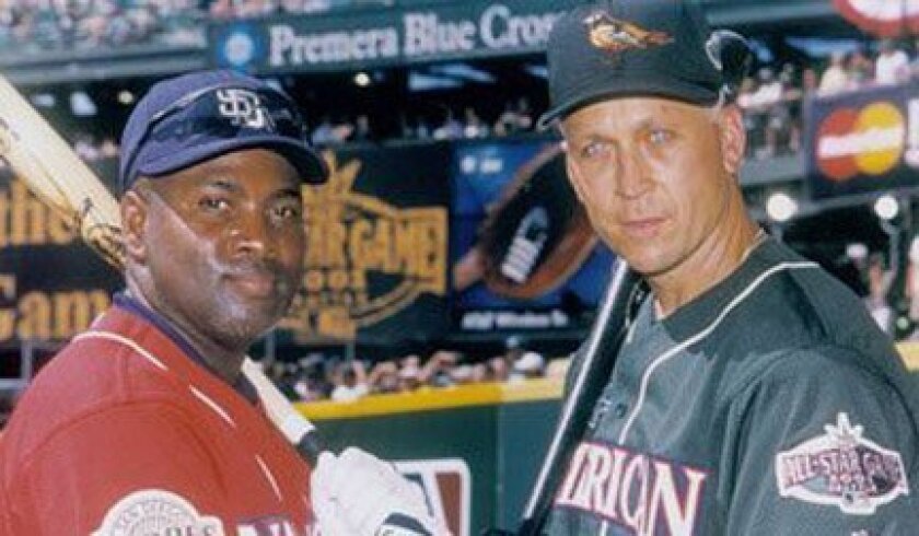 The Padres' Tony Gwynn and the Orioles' Cal Ripken were honored at the 2001 All-Star Game in Seattle after announcing they would be retiring at season's end.