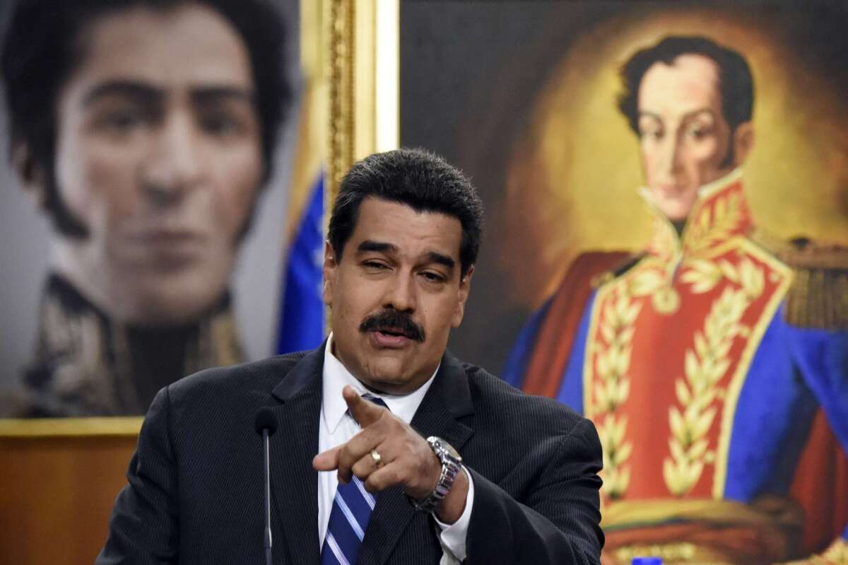 Venezuelan President Nicolas Maduro speaks during a press conference at the Miraflores presidential palace in Caracas on Tuesday.