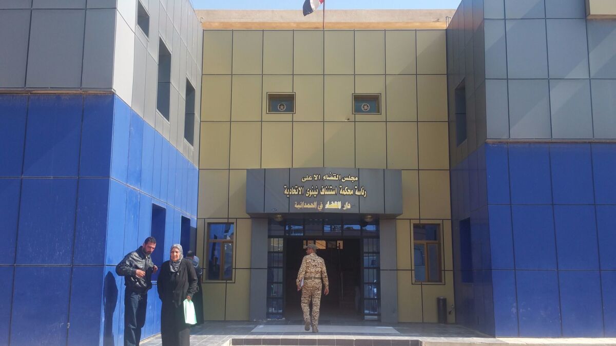 The entrance to the Hamdaniya, Iraq, courthouse, which now shares space with Mosul's judiciary.