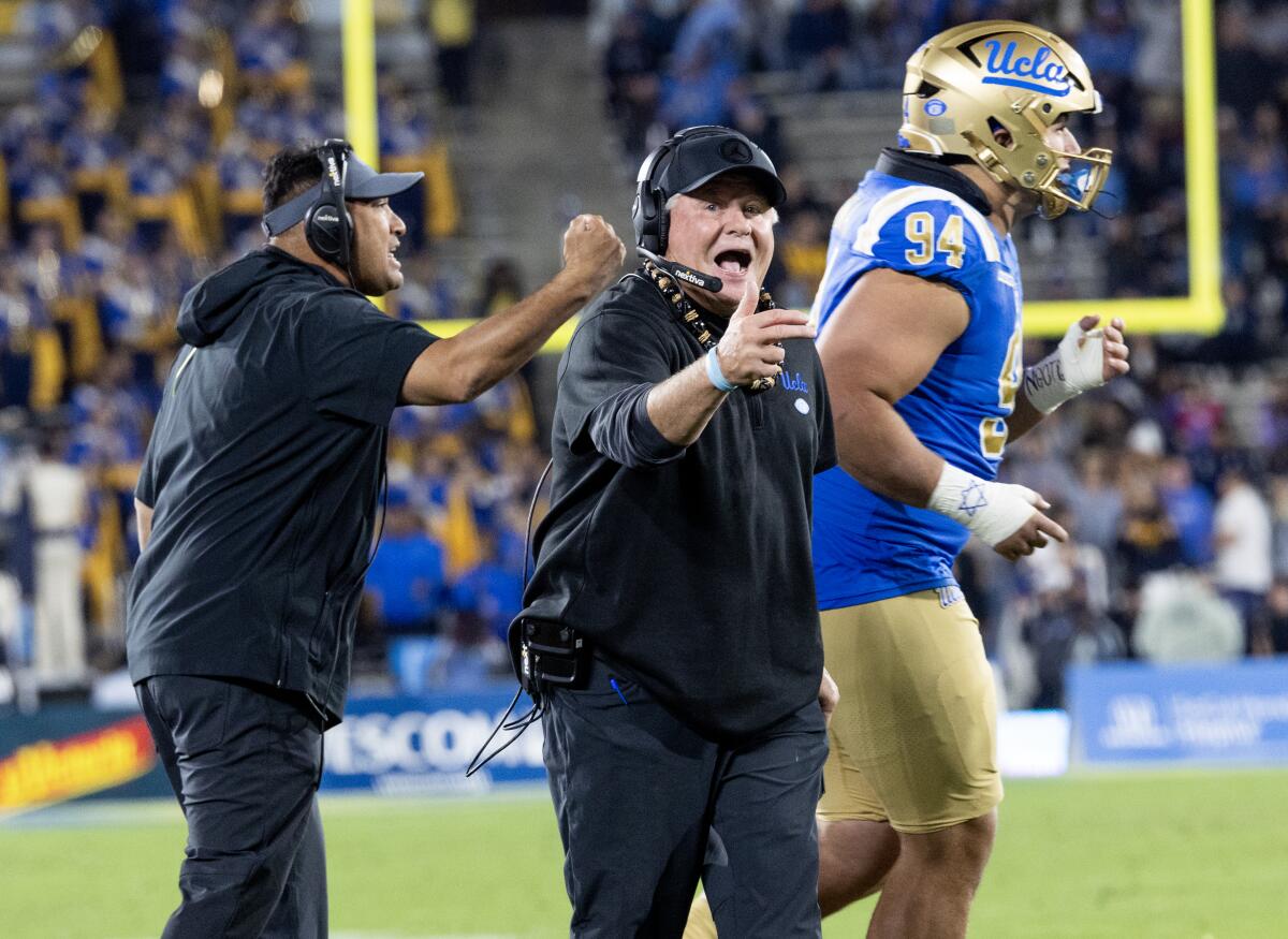 UCLA coach Chip Kelly yells at the officials after his team was called for a defensive penalty 