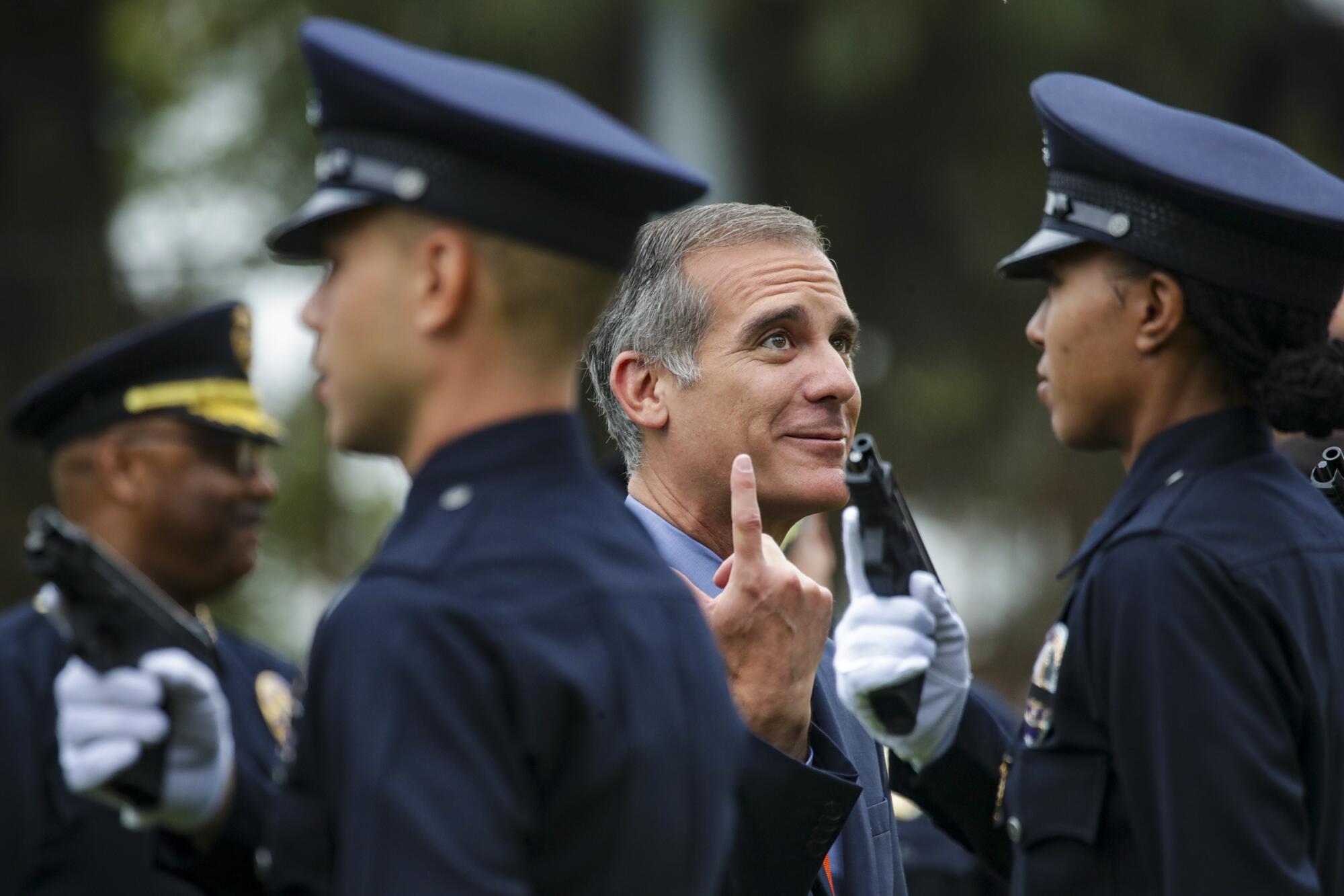 Mayor Eric Garcetti chats with members of the graduating Recruit Class 11-21.