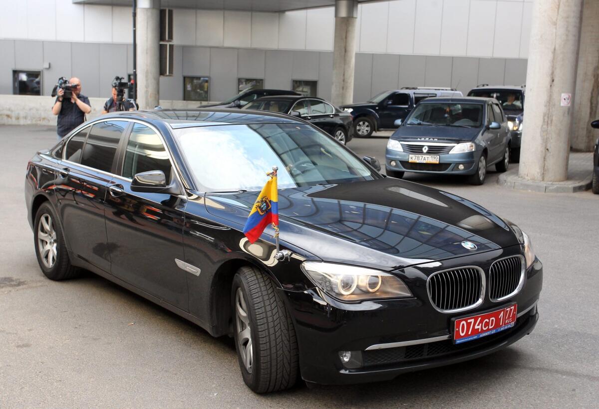 A diplomatic car from the Ecuador Embassy in Russia stands at Sheremetyevo airport in Moscow on Sunday. Edward Snowden, the former contractor for the U.S. National Security Agency, arrived in Moscow from Hong Kong and has reportedly asked for asylum in Ecuador.