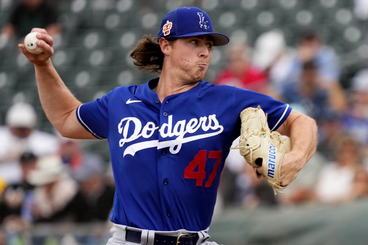 Dodgers starting pitcher Ryan Pepiot throws during a spring game.