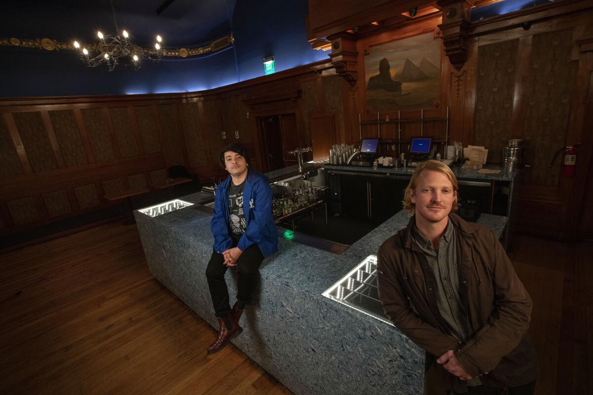 Raghav Desai, left, talent buyer for Lodge Room, an independent live music venue in Highland Park, and Dalton Gerlach, owner