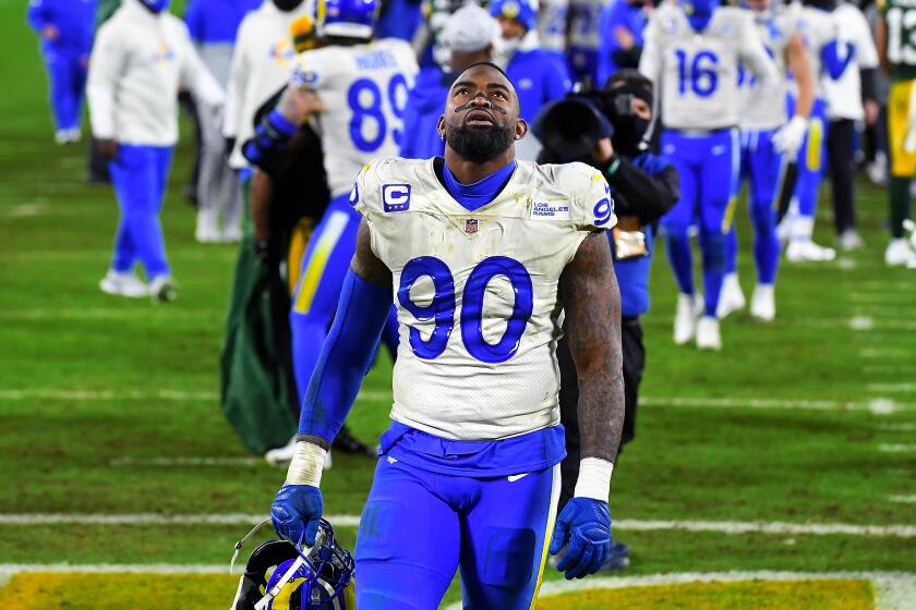 GREEN BAY, WISCONSIN JANUARY 16, 2021-Rams defensive lineman Michael Brockers walks off the field after losing to the Packers during a playoff game at Lambeau Field in Green Bay Saturday. (Wally Skalij/Los Angeles Times)
