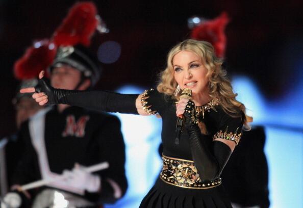 Singer Madonna performs during the Bridgestone Super Bowl XLVI Halftime Show at Lucas Oil Stadium on February 5, 2012 in Indianapolis, Indiana.