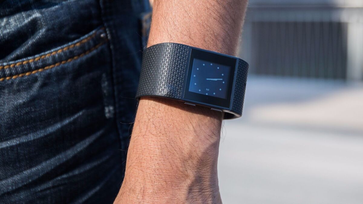 Google is venturing back into the very crowded field of fitness-tracking devices.