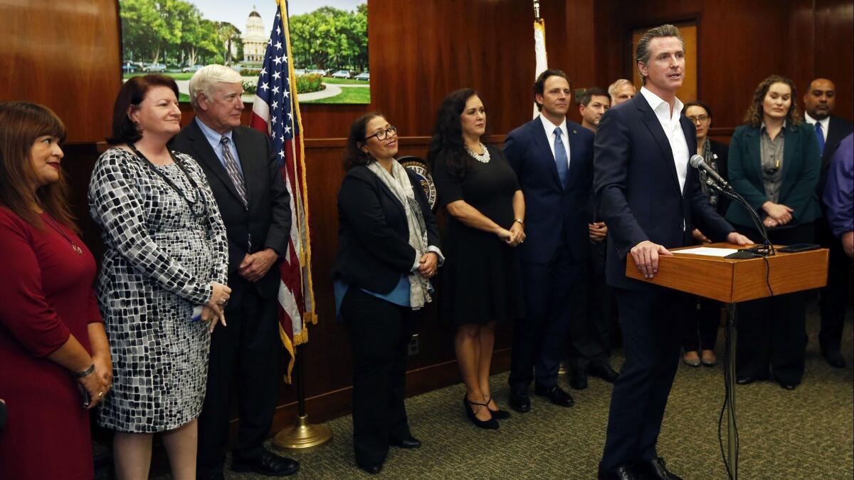 Gov. Gavin Newsom speaks after a January meeting with city leaders about providing relief and humanitarian aid to asylum seekers in San Diego.
