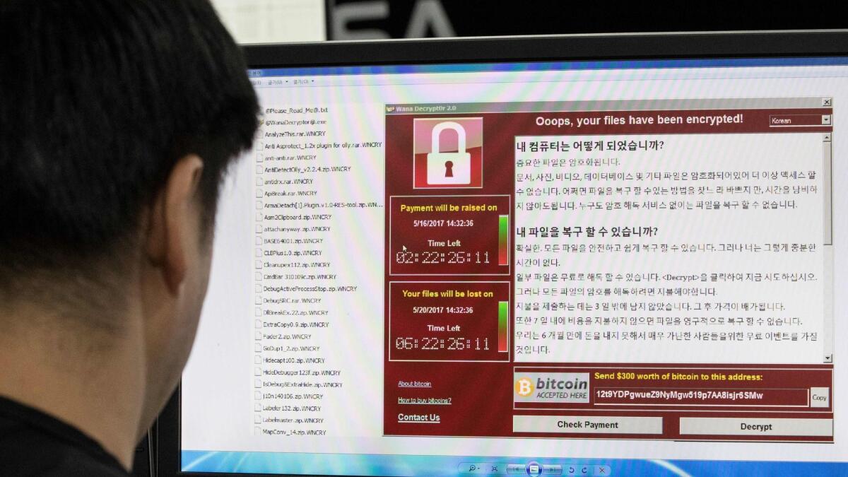 Staff monitoring the spread of ransomware cyber-attacks at the Korea Internet and Security Agency (KISA) in Seoul on May 15, 2017.
