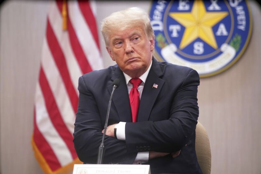 Former President Donald Trump listens to speakers at a border security briefing at the Texas DPS Weslaco Regional Office on Wednesday, June 30, 2021, in Weslaco, Texas. (Joel Martinez/The Monitor via AP, Pool)