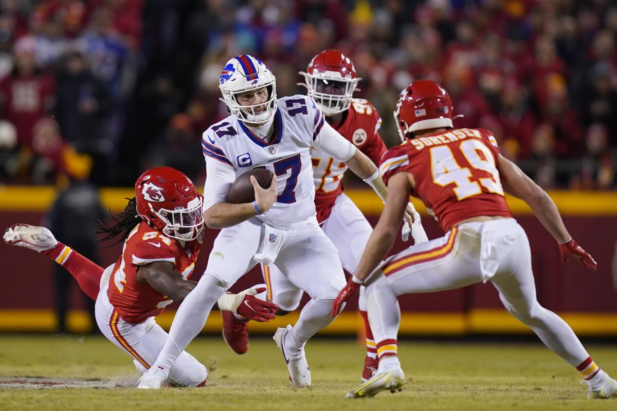 Buffalo Bills quarterback Josh Allen carries the ball against the Kansas City Chiefs.