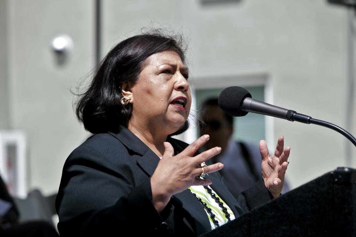 An undated photo of Gloria Molina at a news conference in downtown Los Angeles.
