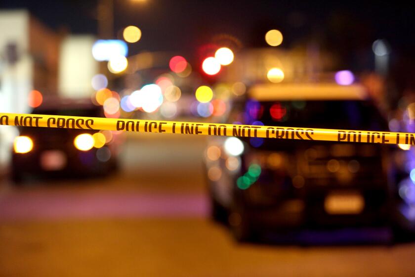Police investigate a multiple murder scene at a dance studio near Garvey Ave. & Garfield Ave.