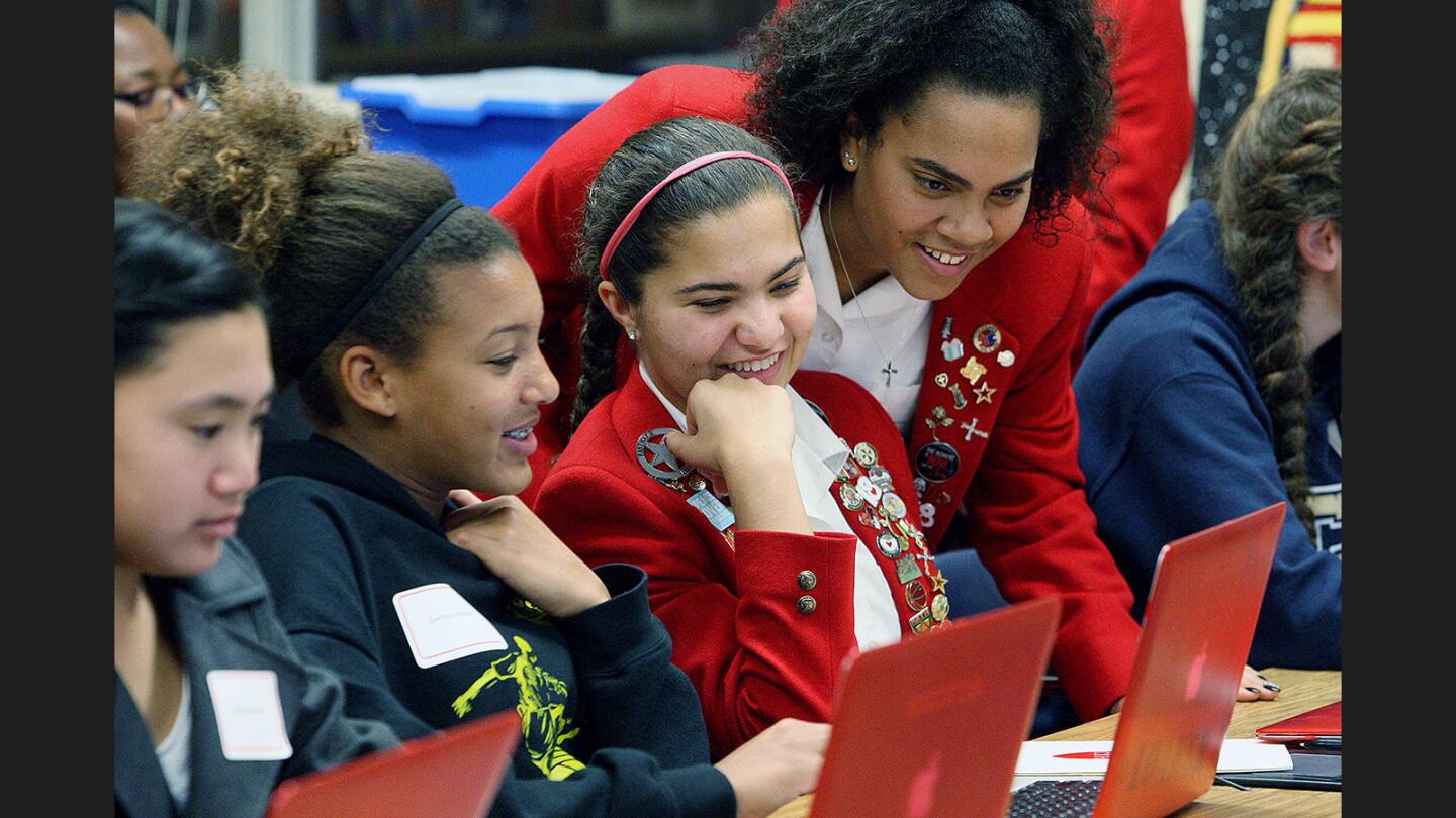 Photo Gallery: 8th grade girls and their parents get classroom tour at FSHA
