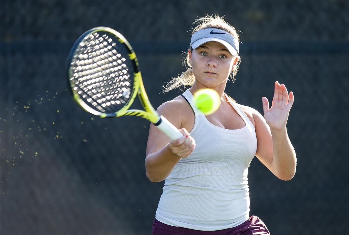 Jessica MacCallum focuses on a forehand during practice at the Racquet Club of Irvine on Tuesday.