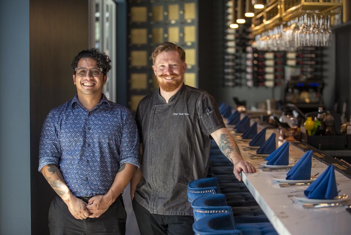 Co-owners of the Paragon Cafe, Markuz Valdez, left, and Dean Isom, on June 8 in Costa Mesa.