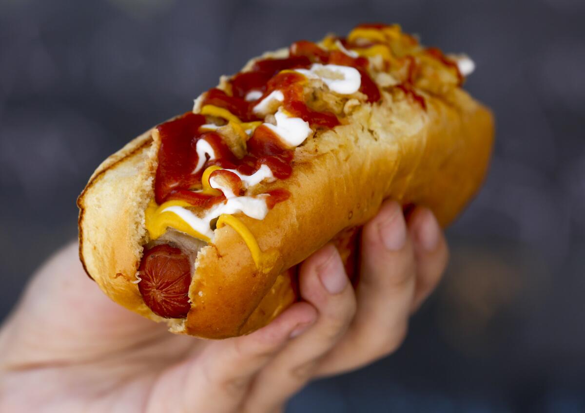 The Cali Dog, a bacon-wrapped hot dog with cheese, coleslaw and pineapple, from Cali Fresh.