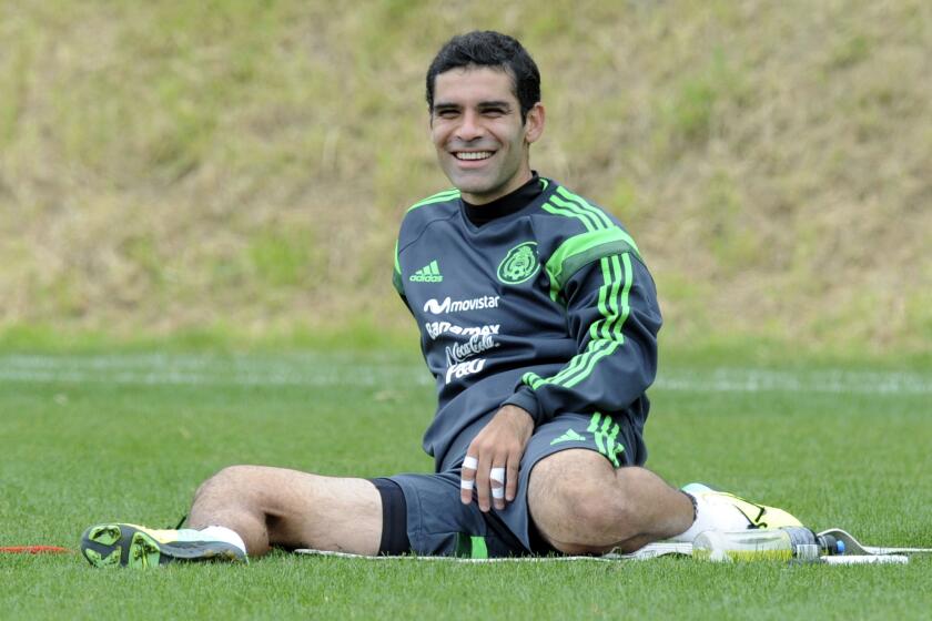 FILE -- In this file photo taken on Nov. 17 2013, Mexico's captain Rafa Marquez smiles while training, in Wellington, New Zealand. Mexico captain Rafa Marquez has signed for Serie A side Hellas Verona. Marquez's former Mexican club Leon announced the move Monday, Aug. 4, 2014, with a statement saying "we wish him the best of success in his new club, in the Italian league, Hellas Verona."(AP Photo/SNPA, Ross Setford) NEW ZEALAND OUT