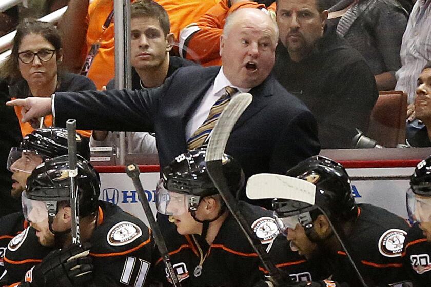 Ducks Coach Bruce Boudreau directs his players during the closing stages of Game 2 of the Western Conference semifinals against the Kings on May 5. Boudreau is on the cusp of reaching a NHL conference final for the first time in his coaching career.