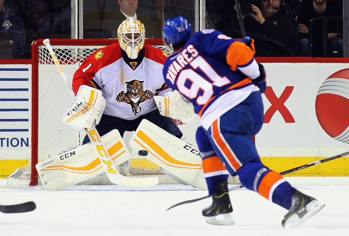 Panthers goalie Roberto Luongo (1) braces for a third period shot from New York Islanders' John Tavares (91) during a game on Mar. 14.