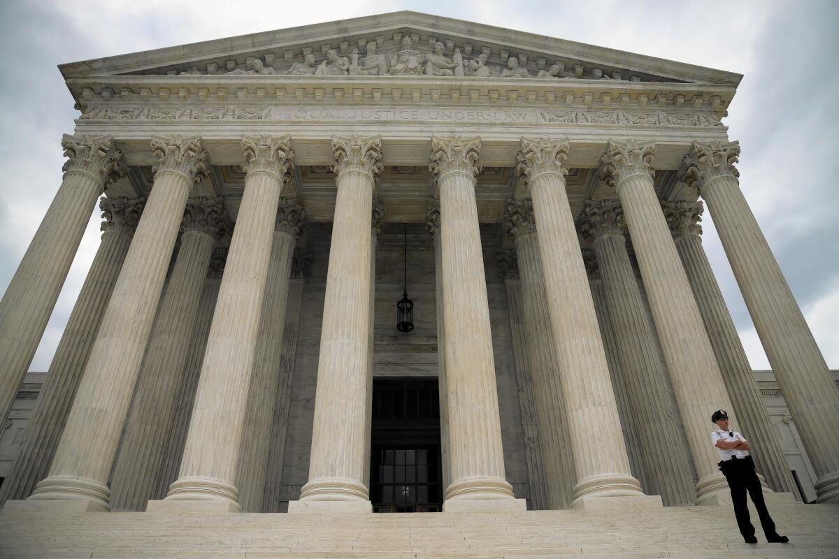 Edison International workers contend in a lawsuit that 401(k) participants should be able to sue plans for retaining imprudent investments. Above, the U.S. Supreme Court in Washington.