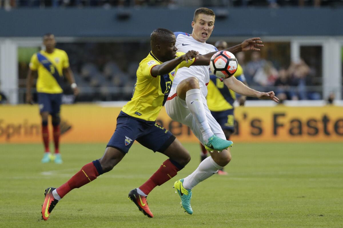 U.S. defender Matt Besler, right, and Ecuador's Enner Valencia fight for the ball during a Copa America Centenario quarterfinal soccer match on June 16.