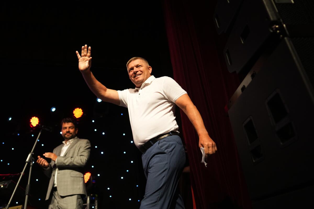 Former Slovak Prime Minister Robert Fico waving to supporters