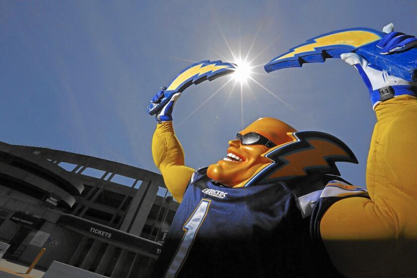 Dan Jauregui -- a.k.a. Boltman -- poses outside Qualcomm Stadium in San Diego. He's not a team mascot but a season ticket holder with extraordinary team loyalty. He remains confident the team will stay in San Diego — but if they don’t, he is ready. He will not follow the team elsewhere.