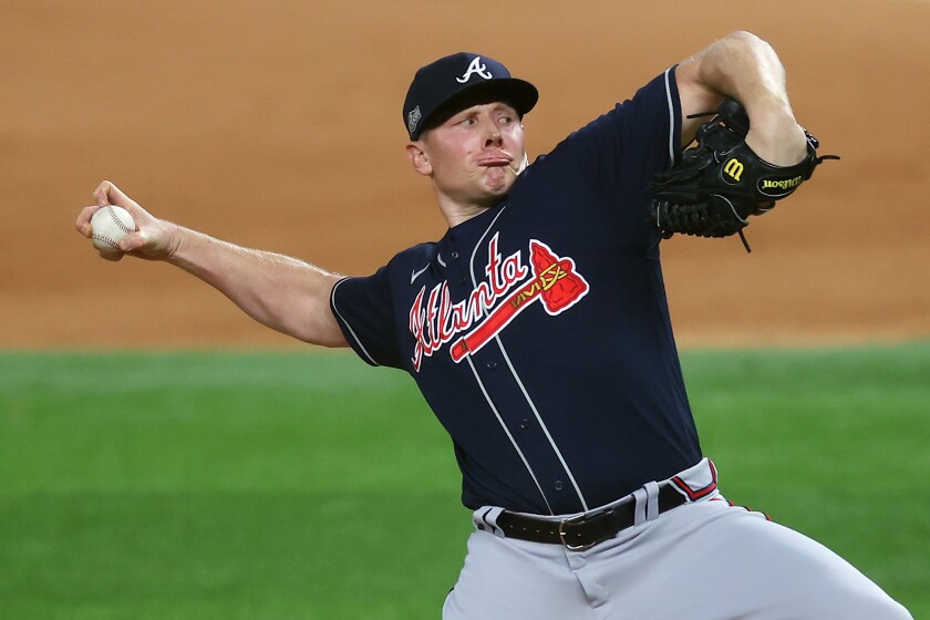 Mark Melancon shown working for the Atlanta Braves against the Los Angeles Dodgers in 2020 NL Championship Series.