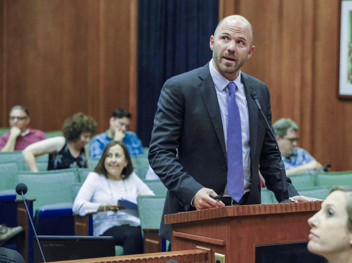 Burbank Unified Supt. Matt Hill goes through a presentation to explain the necessity of a parcel tax at a Burbank Unified School District board meeting on Thursda. A 12-year, 10-cents-per-square-foot annual fee was on the minds of many who spoke Thursday.