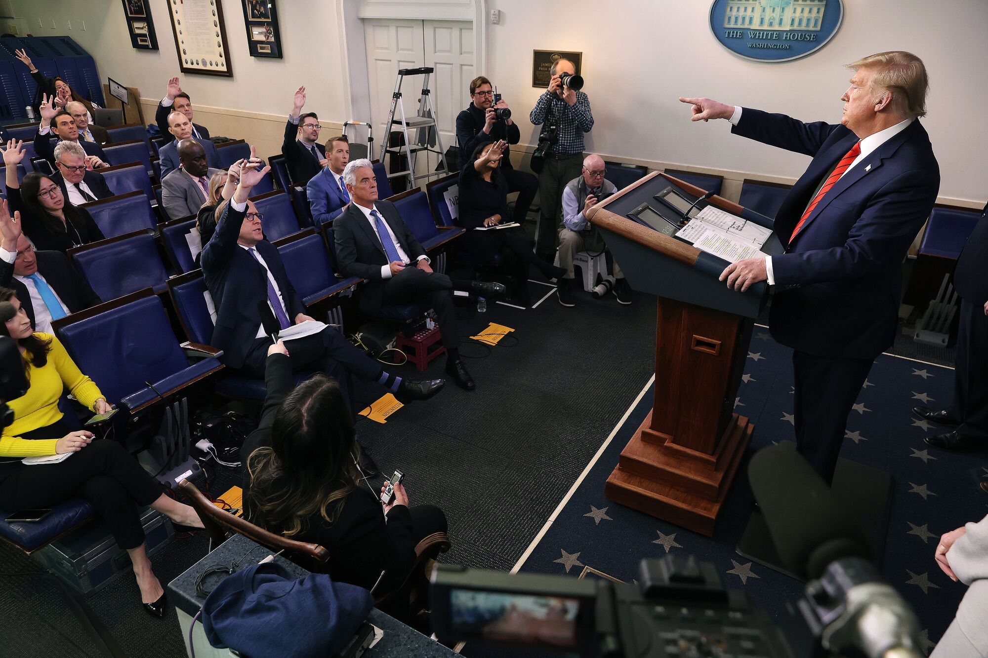 President Trump takes questions from reporters about the coronavirus crisis on March 19.