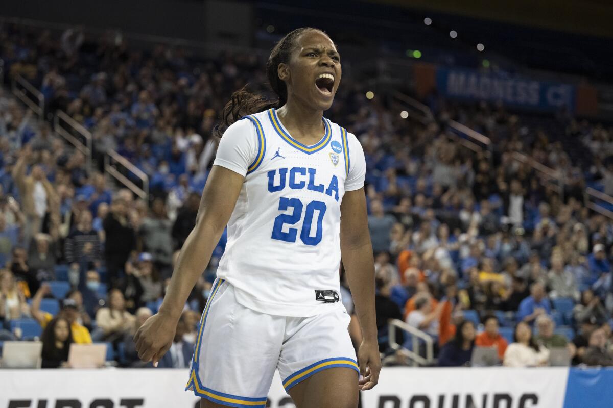 UCLA guard Charisma Osborne reacts after scoring during the second half. 