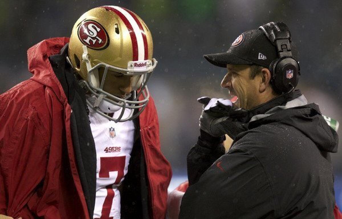 Quarterback Colin Kaepernick and Coach Jim Harbaugh head into Sunday's game against the Cardinals a huge favorite after coming off a 42-13 loss to the Seahawks.
