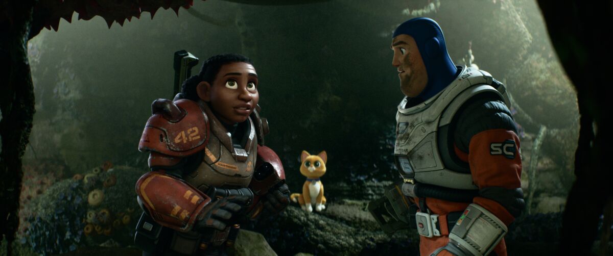 a woman and man in spacesuits with a robotic cat