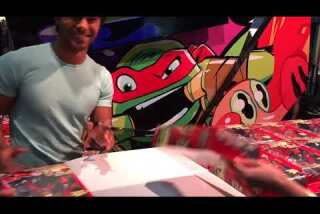 Brennan Mejia, Red Dino Charge Ranger, signs at Comic-Con 2015