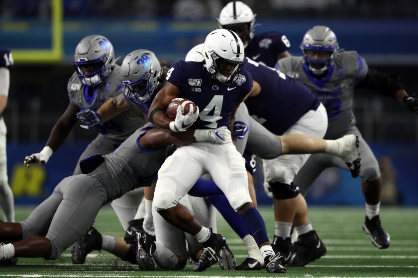 ARLINGTON, TEXAS - DECEMBER 28: Journey Brown #4 of the Penn State Nittany Lions runs the ball against the Memphis Tigers during the first half of the Goodyear Cotton Bowl Classic at AT&T Stadium on December 28, 2019 in Arlington, Texas. (Photo by Ronald Martinez/Getty Images)