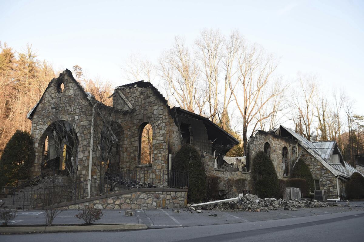 The stone walls are all that stands of the Roaring Fork Baptist Church in Gatlinburg, Tenn., following the devastating wildfires this week.