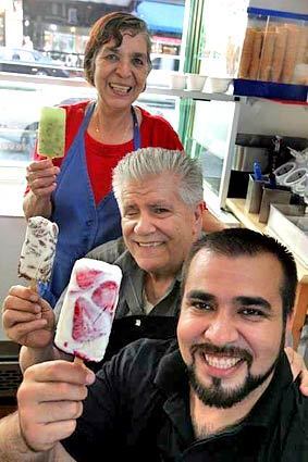Jorge Barragán, front, owner of Paletería La Michoacana, learned to make paletas from his father and mother, Agustin and Maria Elena Barragán.