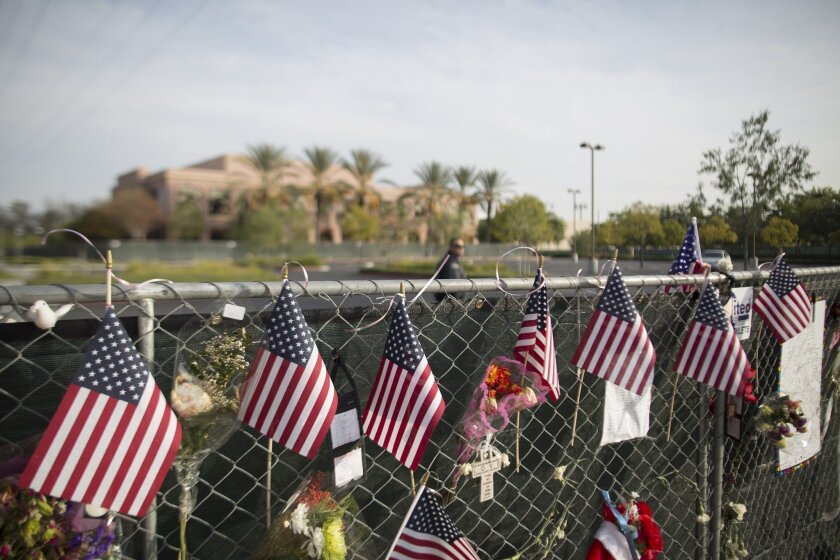Fourteen people were killed and more than 20 injured in the Dec. 2 massacre at the Inland Regional Center in San Bernardino. Under a draft plan, most of the $2.4 million in donations will be distributed to survivors and victims' relatives.