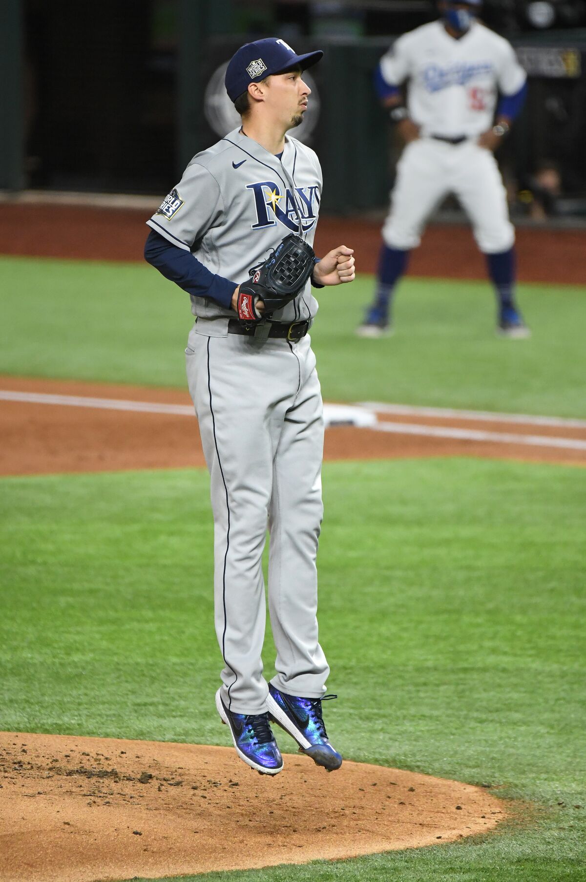Rays pitcher Blake Snell jumps off the mound after just missing a strike call during the first inning.