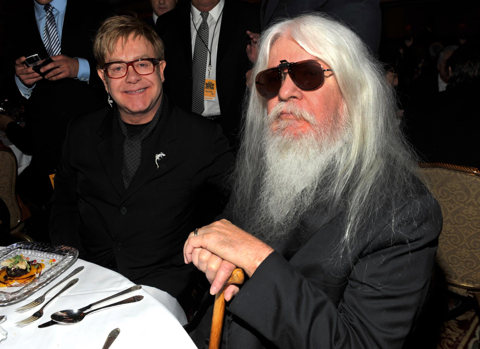 Elton John and Leon Russell at the Rock & Roll Hall of Fame Induction Ceremony in 2011.