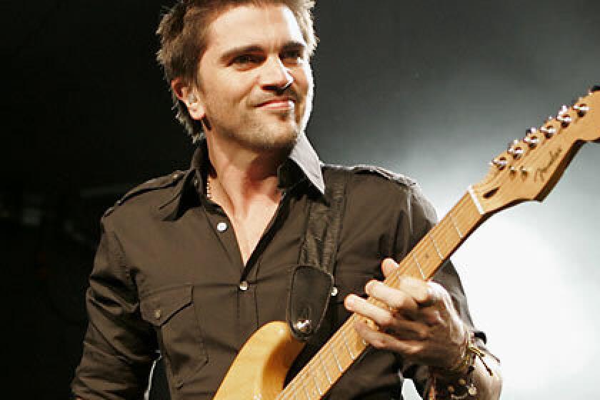 GRATEFUL: Juanes, called the Bono of Latin America for his activism, profusely thanked his audience at the Nokia Theatre on Wednesday. He continues his run there tonight through Sunday.