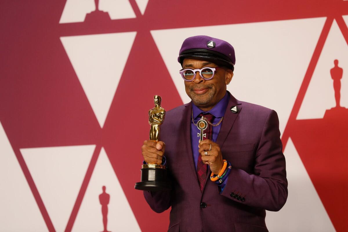Spike Lee, winner of the adapted screenplay award for "BlacKkKlansman," poses in the press room during the 91st Academy Awards.