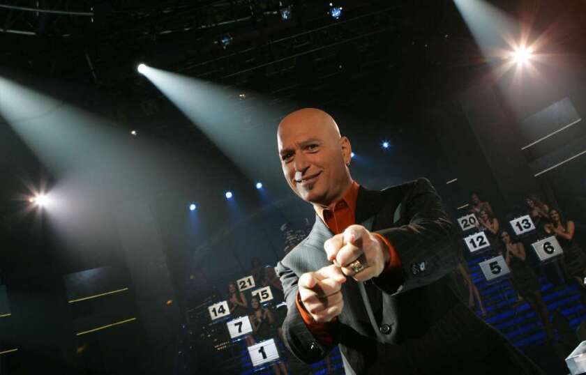 Howie Mandel, shown hosting "Deal or No Deal" in this 2006 file photo, purchased an Encino property once owned by singer Annie Lennox.