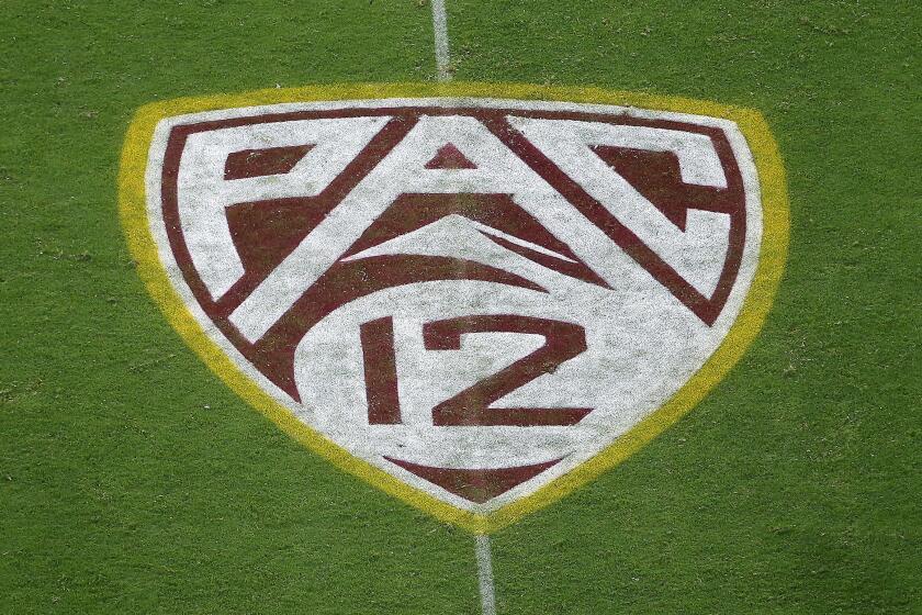 FILE - This Aug. 29, 2019, file photo shows the PAC-12 logo at Sun Devil Stadium.