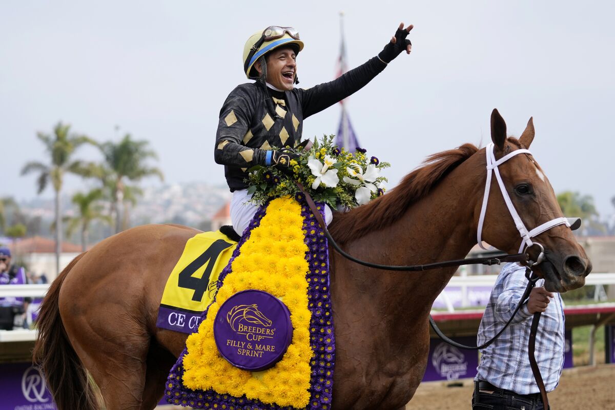 Victor Espinoza celebrates after riding Ce Ce to victory during the Breeders' Cup Filly & Mare Sprint at Del Mar.