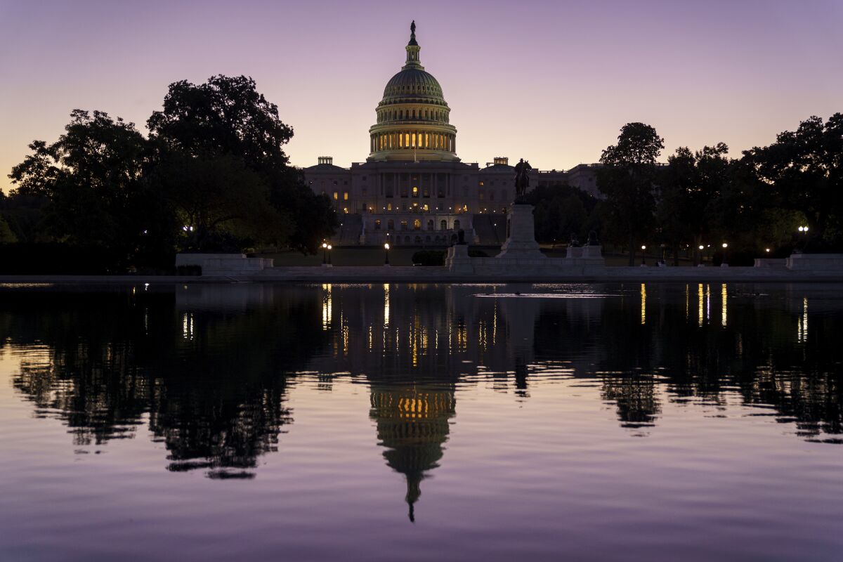 FILE - In this Sept. 27, 2021, file photo the Capitol is seen at dawn in Washington. (AP Photo/J. Scott Applewhite, File)