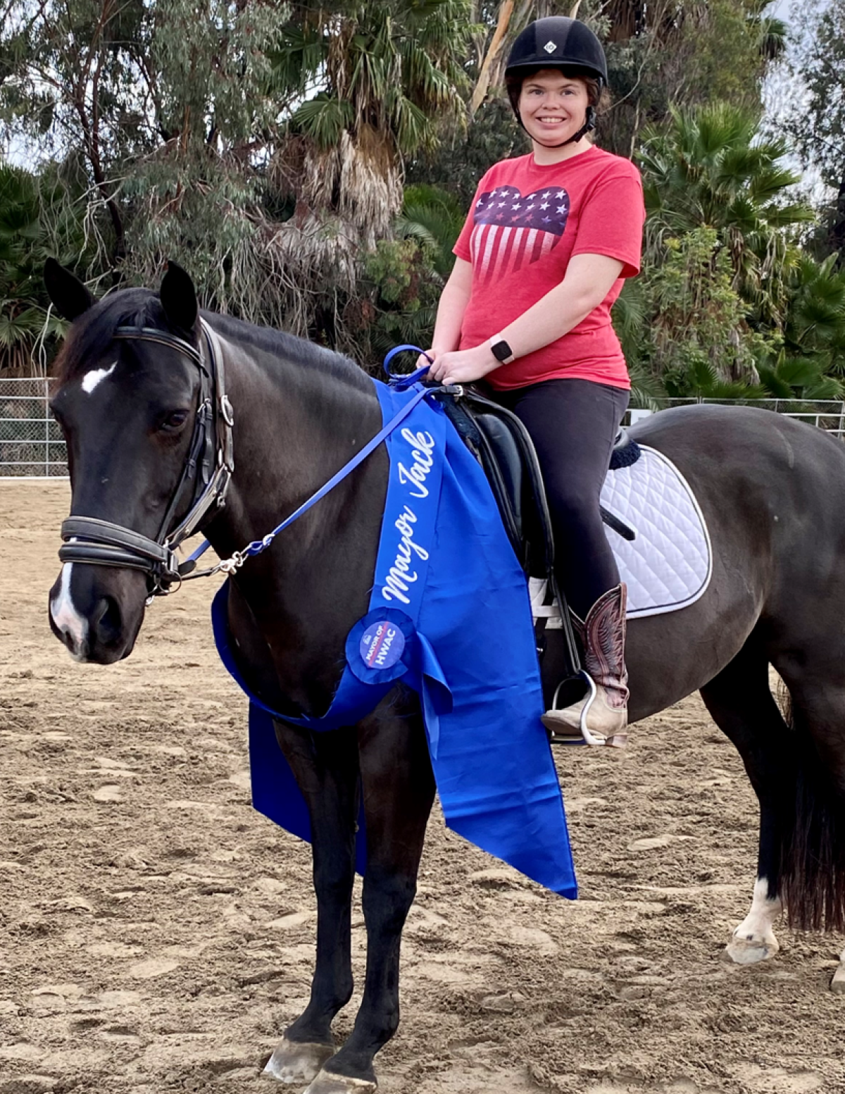 Helen Woodward Animal Center’s Therapeutic Riding Client Elizabeth “Lizzy” Simas and her riding horse, Jack.