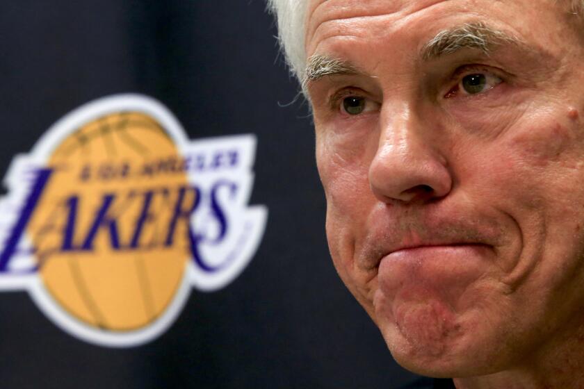 Lakers General Manager Mitch Kupchak in 2014. Kupchak and Lakers Coach Byron Scott watched prospect Emmanuel Mudiay take part in a predraft workout Saturday.